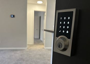 an open door with a digital lock at Timberwalk at Mandarin, Jacksonville, Florida